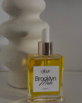 A bottle of Cillage Brooklyn Muse with a white dropper top in a rectangle bottle